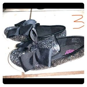 Jojo Siwa slip-on shoes.